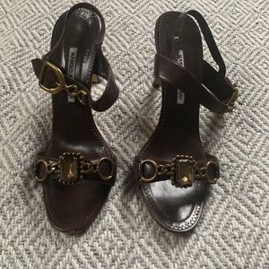 Manolo Blahnik healed, sling back brown leather with gold detailing. Size 10.